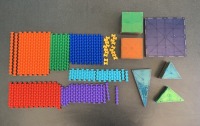 Red, green, dark blue, light blue, yellow, and orange interlocking plastic sticks are pictured alongside colorful square, rectangle, and triangle-shaped Magna Tiles.